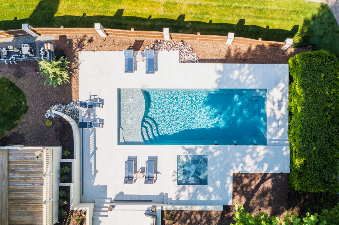 Drone photography directly above a fiberglass pool