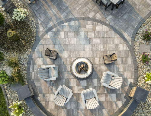 Create an Inviting Atmosphere With a Retaining Wall and Fire Pit for Cozy Gatherings in the Syracuse, IN Area